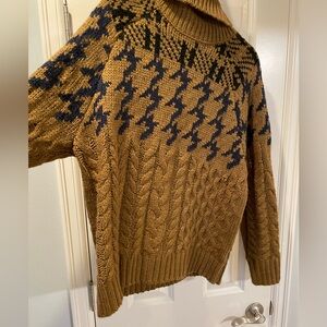 Turtleneck cable knit sweater